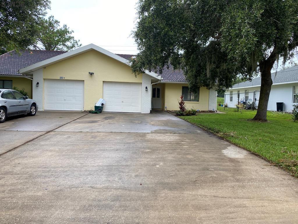 Spacious 2 bedroom, 2 bathroom duplex located in the desirable C area of Palm Coast, just across from the scenic canals. This well-maintained unit offers a bright and open floor plan with no carpet.