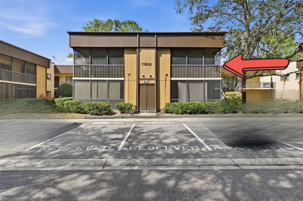 Photo of 11808 Raintree Lake Lane #C, Tampa, FL 33617 (MLS # TB8473720)