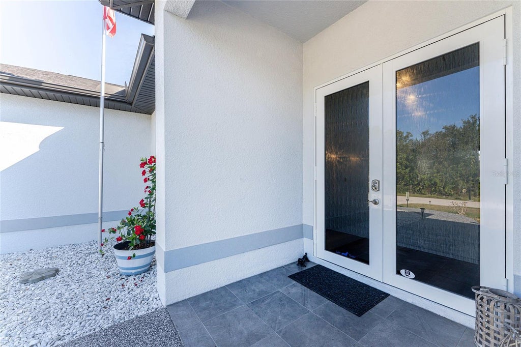 Photo of 23387 Cedarton Avenue, Punta Gorda, FL 33980 (MLS # C7528617)