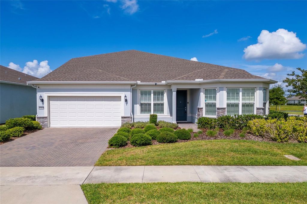 Photo of 13810 Tybee Beach Lane, Orlando, FL 32827 (MLS # O6405323)
