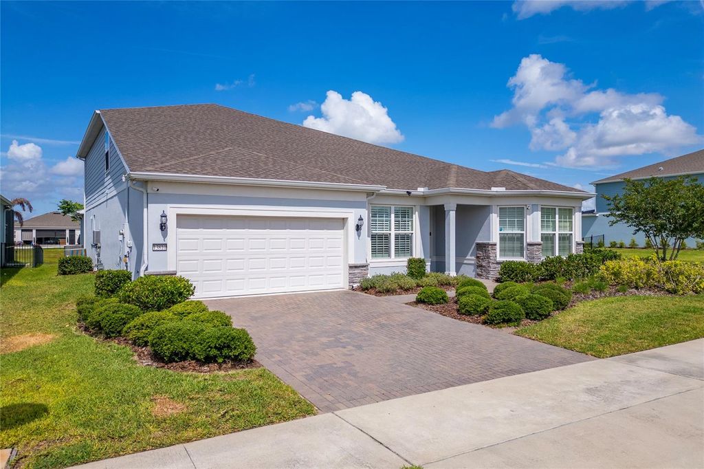Photo of 13810 Tybee Beach Lane, Orlando, FL 32827 (MLS # O6405323)