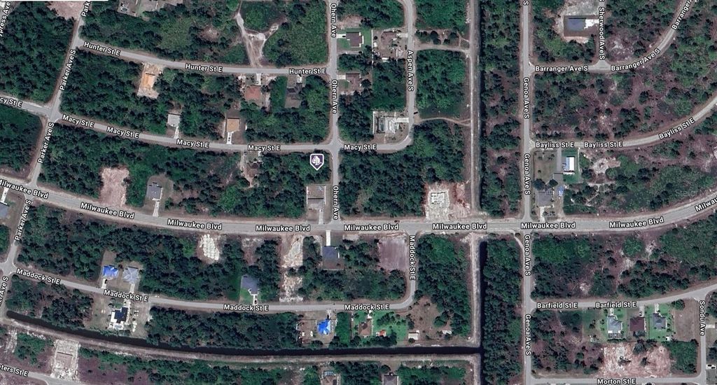 Photo of 1040 Macy Street E, Lehigh Acres, FL 33974 (MLS # A4641971)