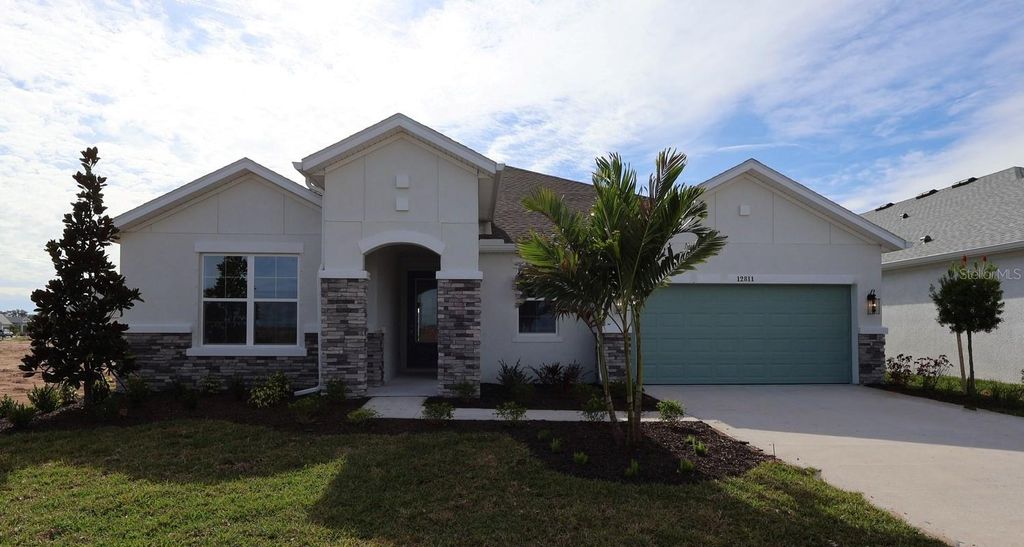 Photo of 12811 Salty Dog Crossing, Palmetto, FL 34221 (MLS # TB8445430)