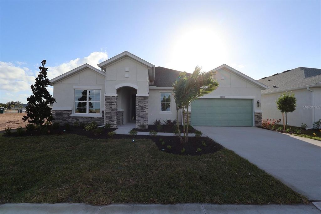 Photo of 12811 Salty Dog Crossing, Palmetto, FL 34221 (MLS # TB8445430)