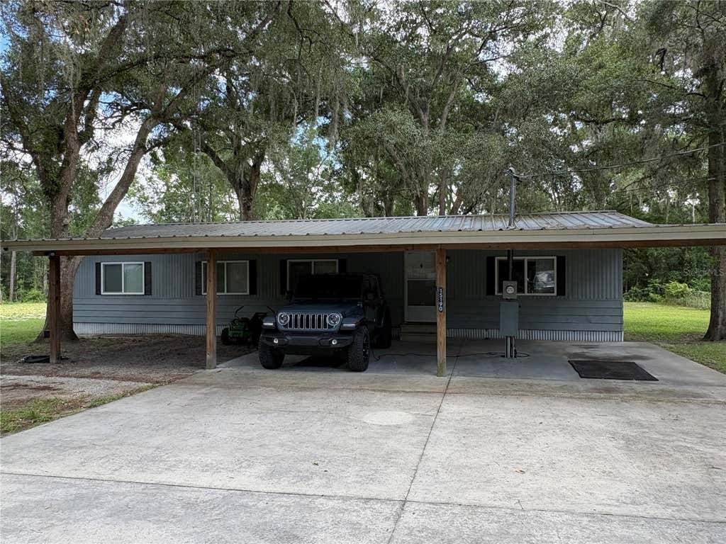 Photo of 15190 NE 144th Street, Fort Mccoy, FL 32134 (MLS # OM726908)