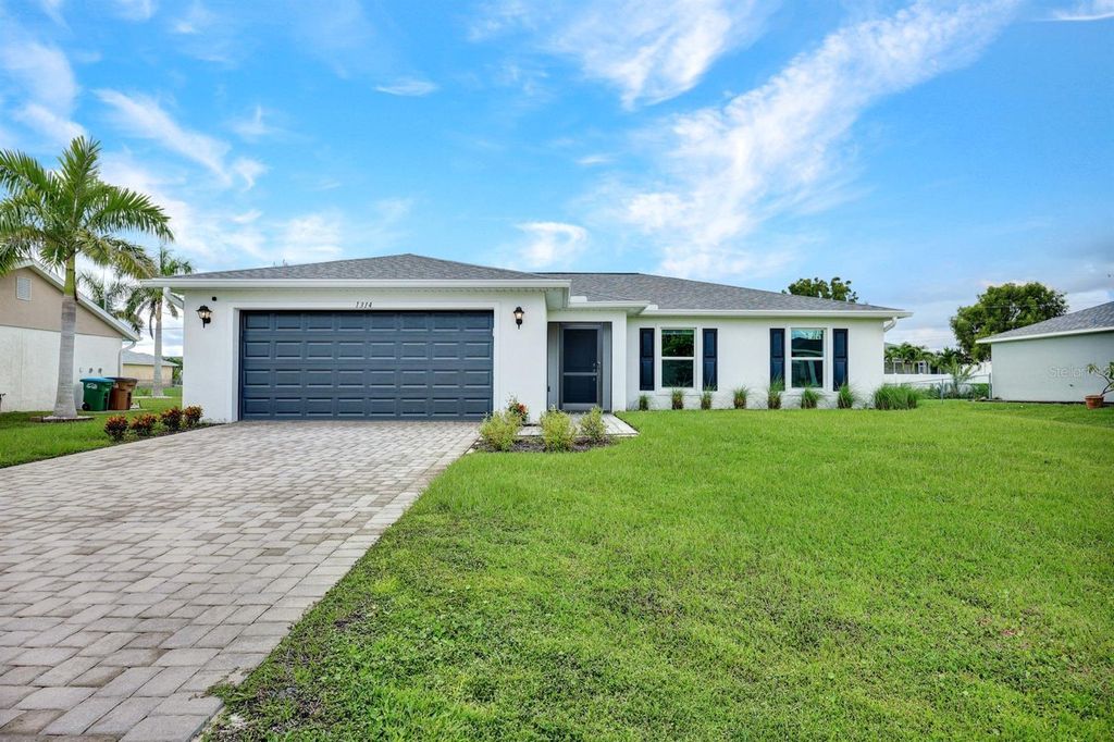 Photo of 1314 SW 35th Terrace, Cape Coral, FL 33914 (MLS # C7514813)