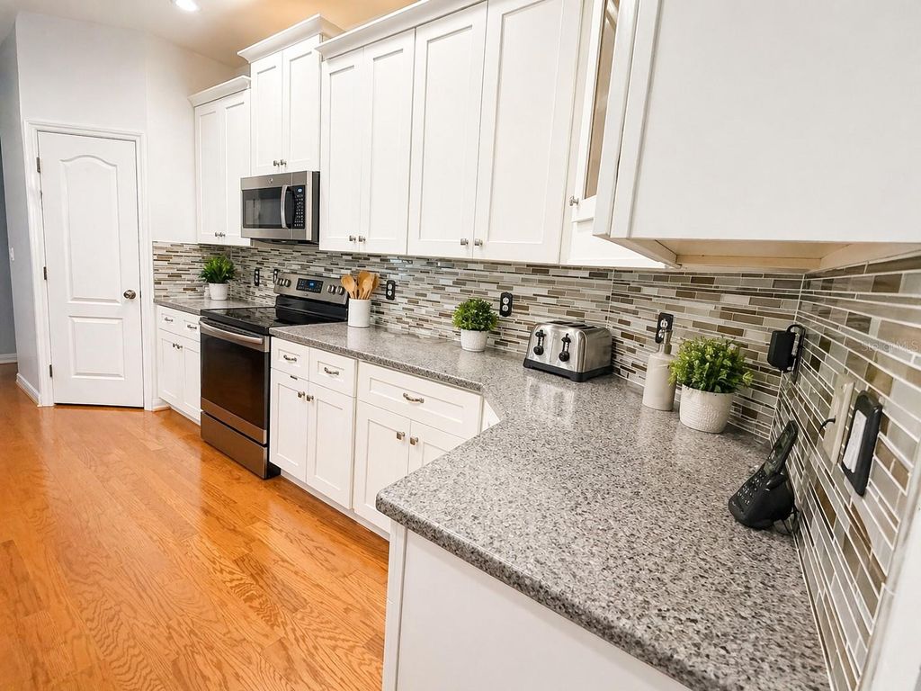 Photo of 1314 Emerald Hill Way, Valrico, FL 33594 (MLS # TB8500266)