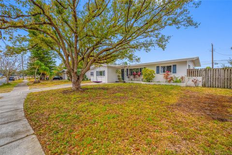 Photo of 1268 Robin Hood Lane, Dunedin, FL 34698 (MLS # TB8472821)