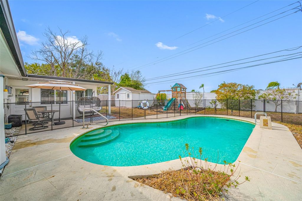 Photo of 1268 Robin Hood Lane, Dunedin, FL 34698 (MLS # TB8472821)