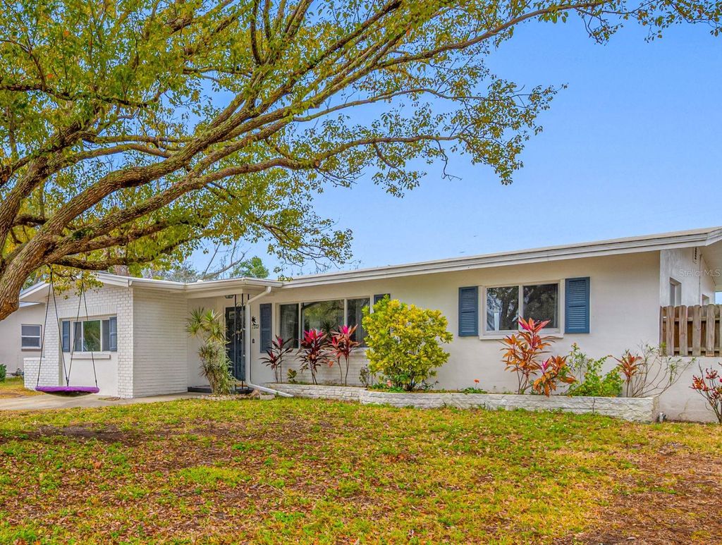 Photo of 1268 Robin Hood Lane, Dunedin, FL 34698 (MLS # TB8472821)