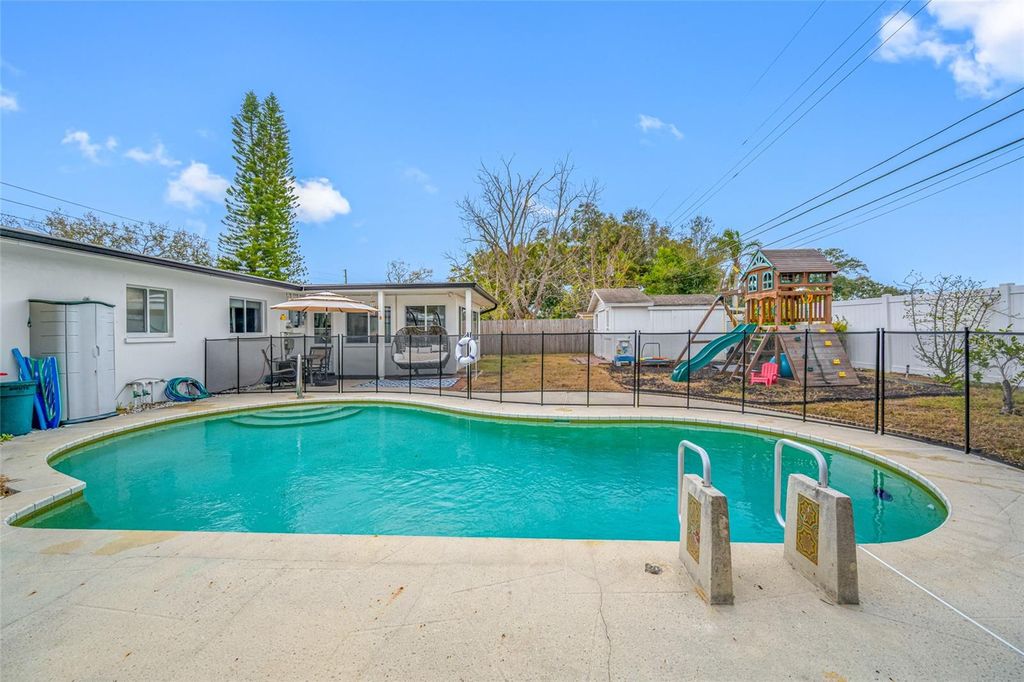 Photo of 1268 Robin Hood Lane, Dunedin, FL 34698 (MLS # TB8472821)