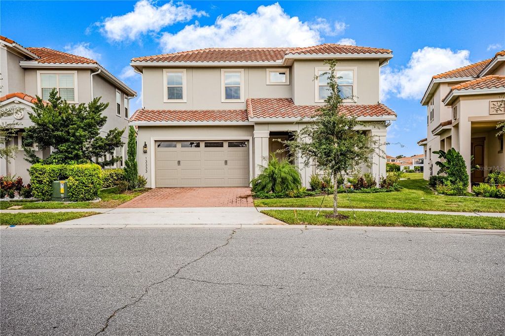 Photo of 13333 Oakenshaw Lane, Orlando, FL 32832 (MLS # O6368520)