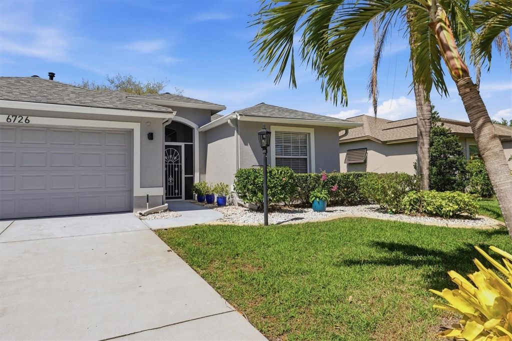 Photo of 6726 W Country Club Lane, Sarasota, FL 34243 (MLS # A4686098)