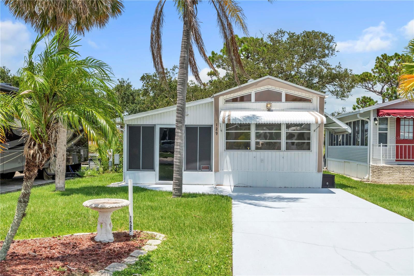 Welcome to the highly sought-after Kings Gate Club, a vibrant 55+ community offering direct water access and resort-style amenities! This beautifully updated 1 bedroom 1 bath home features new flooring, modern light fixtures, and a private washer/dryer in unit—making it completely move-in ready. Enjoy water views from your backyard on your private dock, and bring your pontoon boat to cruise the creek out to Shakett Creek and Dona Bay. This property includes its own dock, perfect for fishing or relaxing on the water. Kings Gate Club offers an unmatched Florida lifestyle with tennis, pickleball, shuffleboard, a heated pool, fitness center, clubhouse, and more. Golf cart-friendly and full of social opportunities, this is the perfect Florida escape! Don't miss your chance to own a piece of paradise in Nokomis.