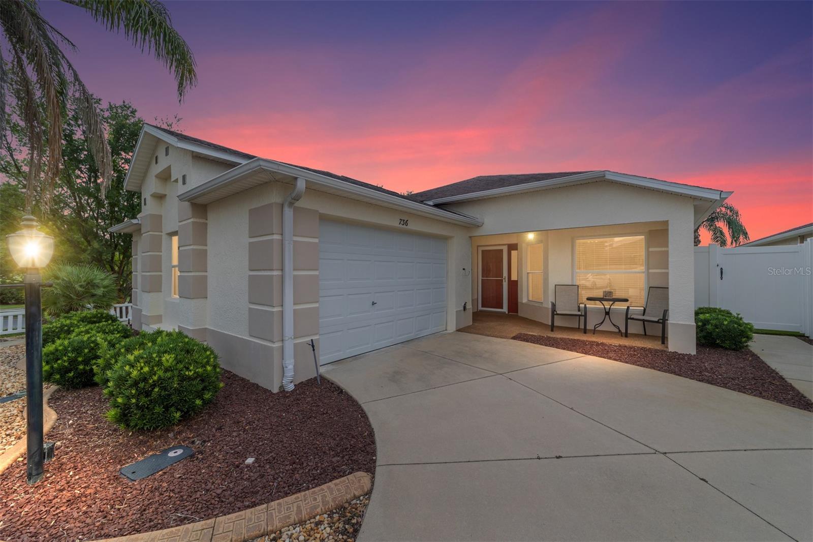 LOCATION, LOCATION, LOCATION! BOND PAID! TURN-KEY! GOLF & WATER VIEW on this Move-In Ready 3/2 Grantham BLOCK & STUCCO Courtyard Villa situated in the Village of Bonita on a maintenance-free, OVERSIZED CORNER lot! Step through the glass entry door into an inviting, light-filled space. The VAULTED CEILINGS create an open and spacious atmosphere with the living, dining, and kitchen areas flowing seamlessly, featuring easy access to the HUGE BIRDCAGE with Chattahoochee River rock, and GOLF & WATER views of Havana Kenya Championship Course! The LARGE kitchen boasts MAPLE CABINETS w/ PULL-OUTS, and a breakfast bar. The primary suite is a private retreat with VAULTED ceilings, sliders to the birdcage, and an en-suite bathroom with a WALK-IN GLASS shower, a linen closet, and DUAL sinks. Guests will feel right at home in the additional bedrooms, which feature vaulted ceilings and ample space. The spacious guest bathroom includes a tub/shower combo for comfort and convenience. The garage has epoxy flooring and IKEA storage cabinets throughout. Other features include: INSIDE laundry, a 20FT flagpole on the side, ROOF (2014), HVAC (2022), HWH (2022), turn-key condition, and NO BOND! Located in the heart of The Villages, this home provides easy access to LAKE SUMTER LANDING, BROWNWOOD PADDOCK SQUARE, recreation centers, and golf courses. With nearby shopping, dining, and numerous amenities, you'll enjoy everything! Call me today for your private showing!