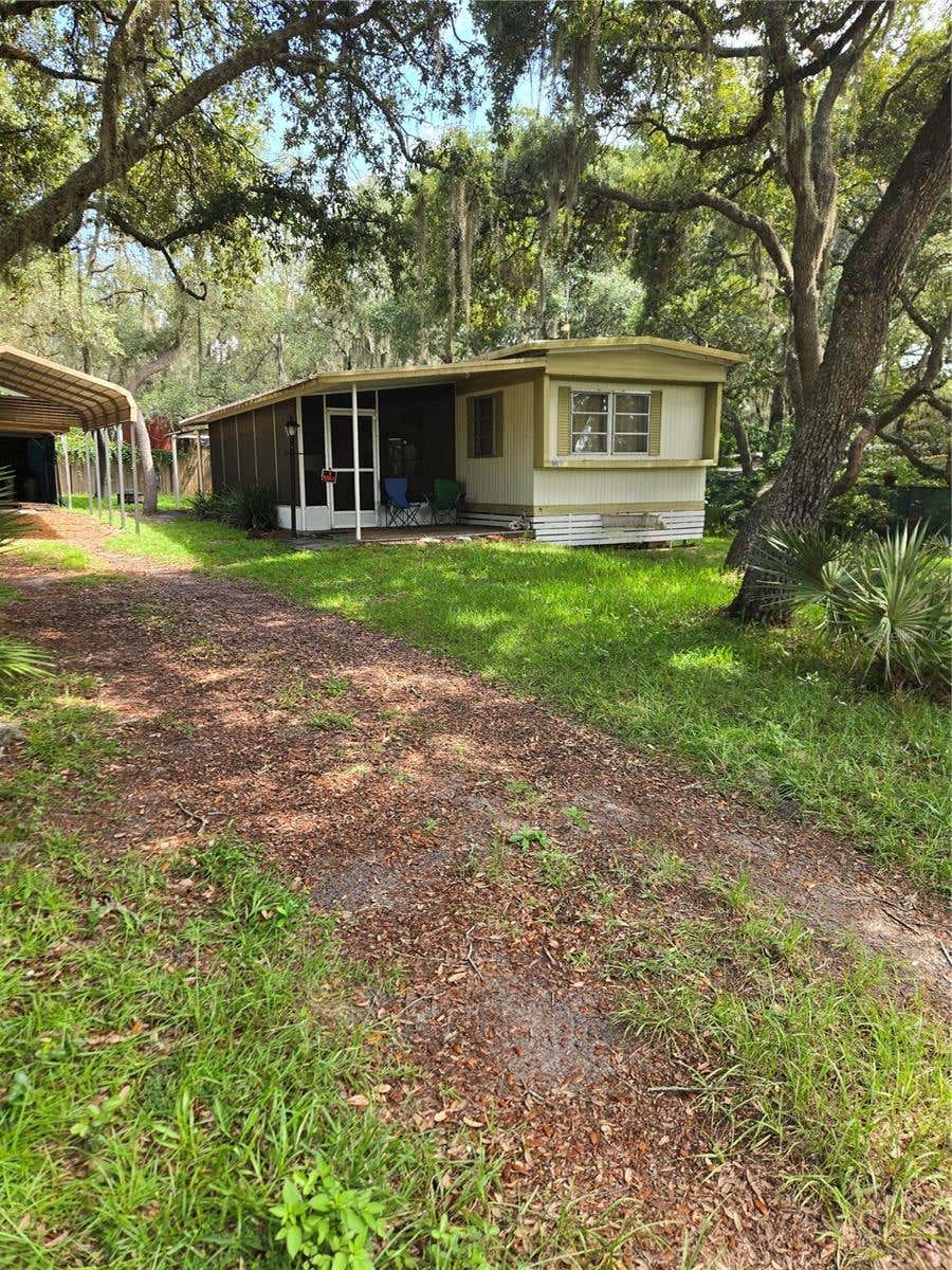 Photo of 18927 SE 18th Place, Silver Springs, FL 34488 (MLS # OM729851)