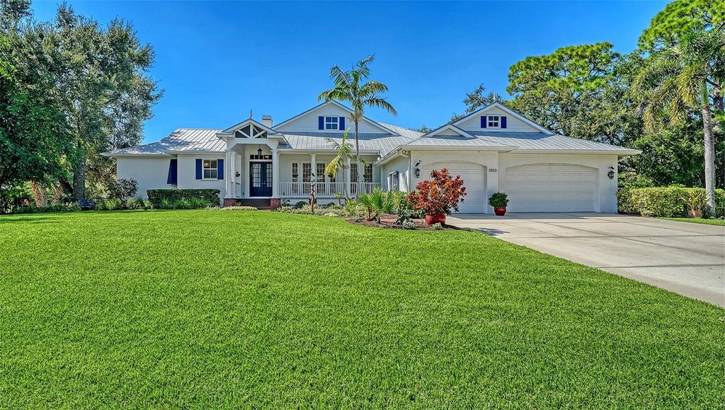 Photo of 3930 Elysian Woods Lane, Sarasota, FL 34231 (MLS # A4668774)