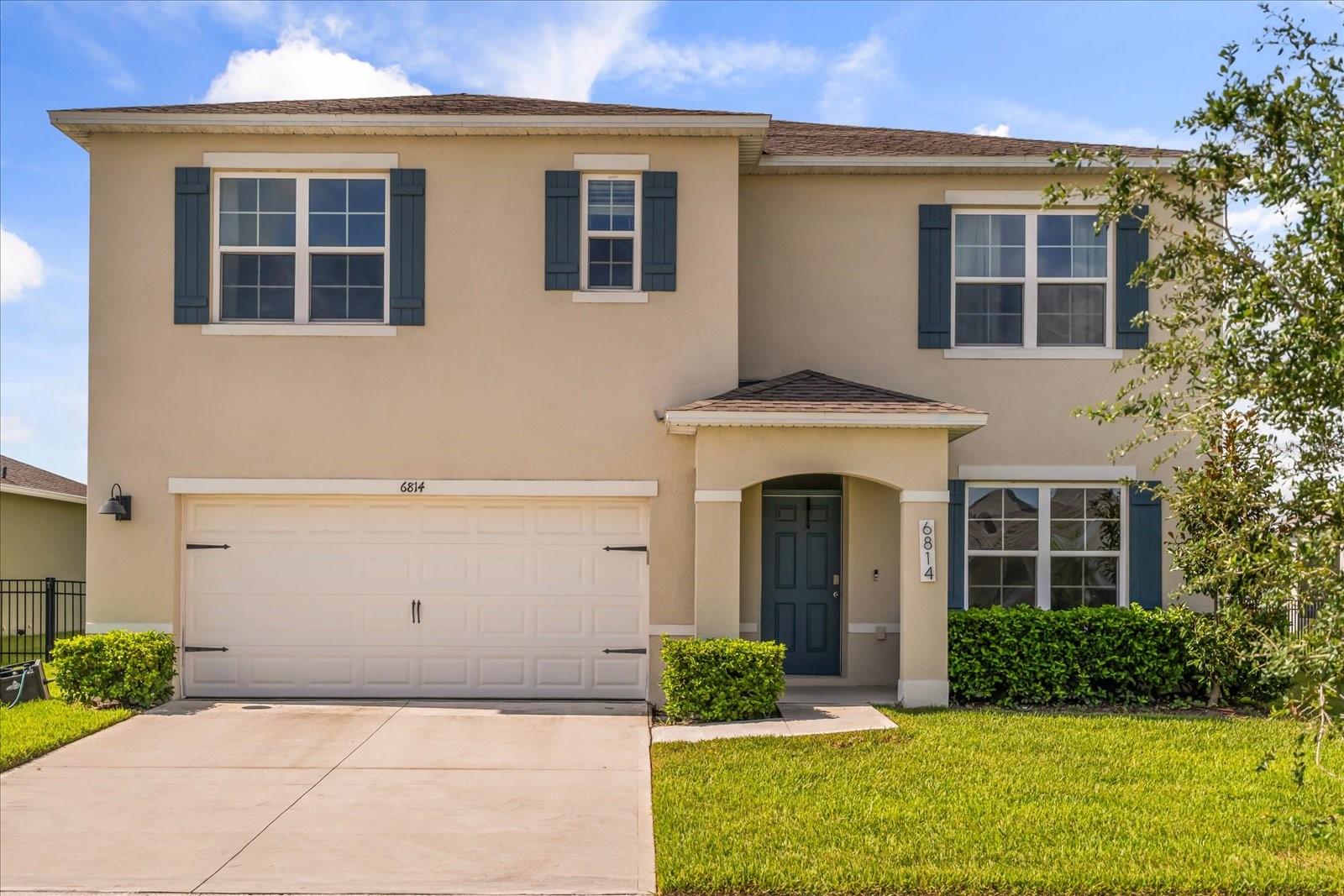 LAKE VIEW and an oversized lot make this stunning two-story Hayden model in the desirable Harmony West community truly special. Built in 2022 and only 3 years old, this home offers the perfect combination of space, functionality, and resort-style living.
Enjoy 5 spacious bedrooms and 3 full bathrooms, including a first-floor guest suite with full bath ideal for multigenerational living or visiting guests. The open-concept kitchen features a large island, breakfast bar, and stainless steel appliances, seamlessly flowing into the bright living and dining areas for effortless entertaining and everyday comfort. Upstairs, the expansive primary suite boasts two walk-in closets and dual vanities, while the versatile loft provides the perfect space for a media room, home office, or play area. Step outside to a massive backyard overlooking the lake, offering endless possibilities to relax, entertain, or create your dream outdoor oasis.
Harmony West delivers a true resort-style lifestyle, featuring a 5,000 sq ft pool with sun shelf and splash pad, a clubhouse with chef’s kitchen and lounge, fitness center, dog parks, playgrounds, walking/biking/equestrian trails, and a scenic amphitheater for community events. Conveniently located just minutes from Lake Nona, Medical City, US-192, and Florida’s Turnpike, with easy access to Orlando, beaches, shopping, and dining, plus the Johnny Miller Signature Harmony Golf Preserve. Zoned for top-rated Osceola County schools, this home truly checks all the boxes.
This is the lake-view home you’ve been waiting for—schedule your showing today!