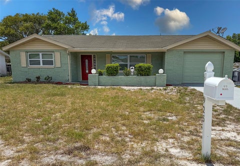Photo of 10925 Piccadilly Road, Port Richey, FL 34668 (MLS # TB8518096)
