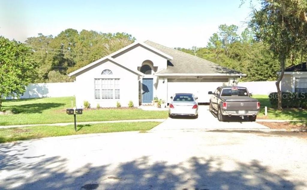 Photo of 16802 Hawkglen Place, Lithia, FL 33547 (MLS # J991556)