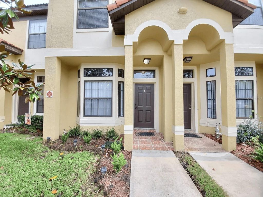 Photo of 6037 Scotchwood Glen #4, Orlando, FL 32822 (MLS # O6365998)
