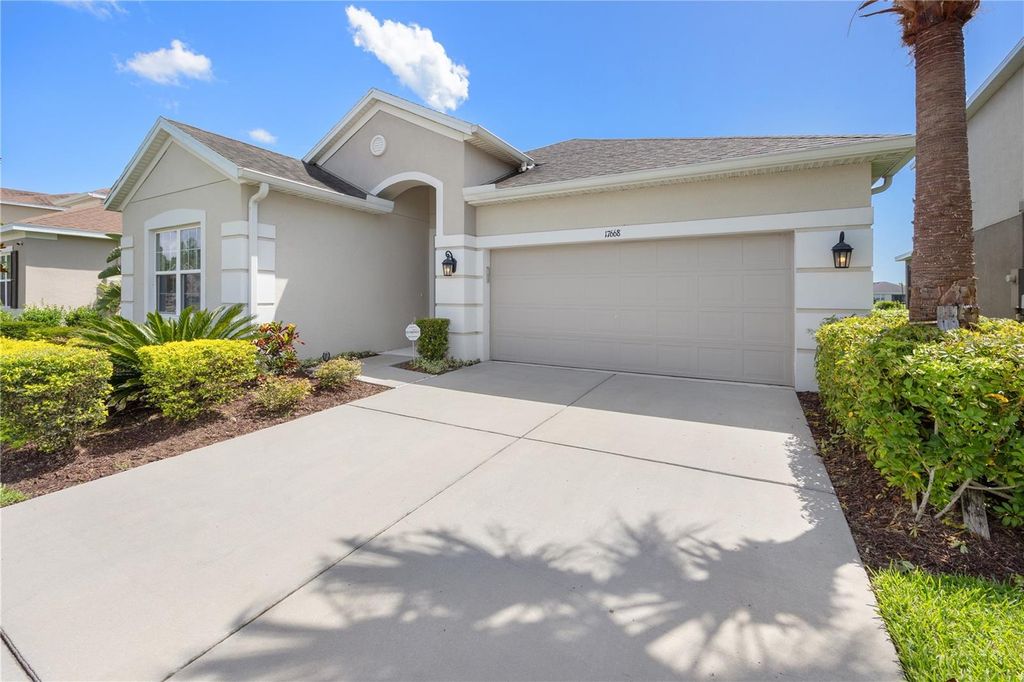 Photo of 17668 Bright Wheat Drive, Lithia, FL 33547 (MLS # TB8390124)