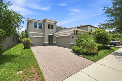 Photo of 4801 Ballantrae Boulevard, Land O Lakes, FL 34638 (MLS # TB8531114)