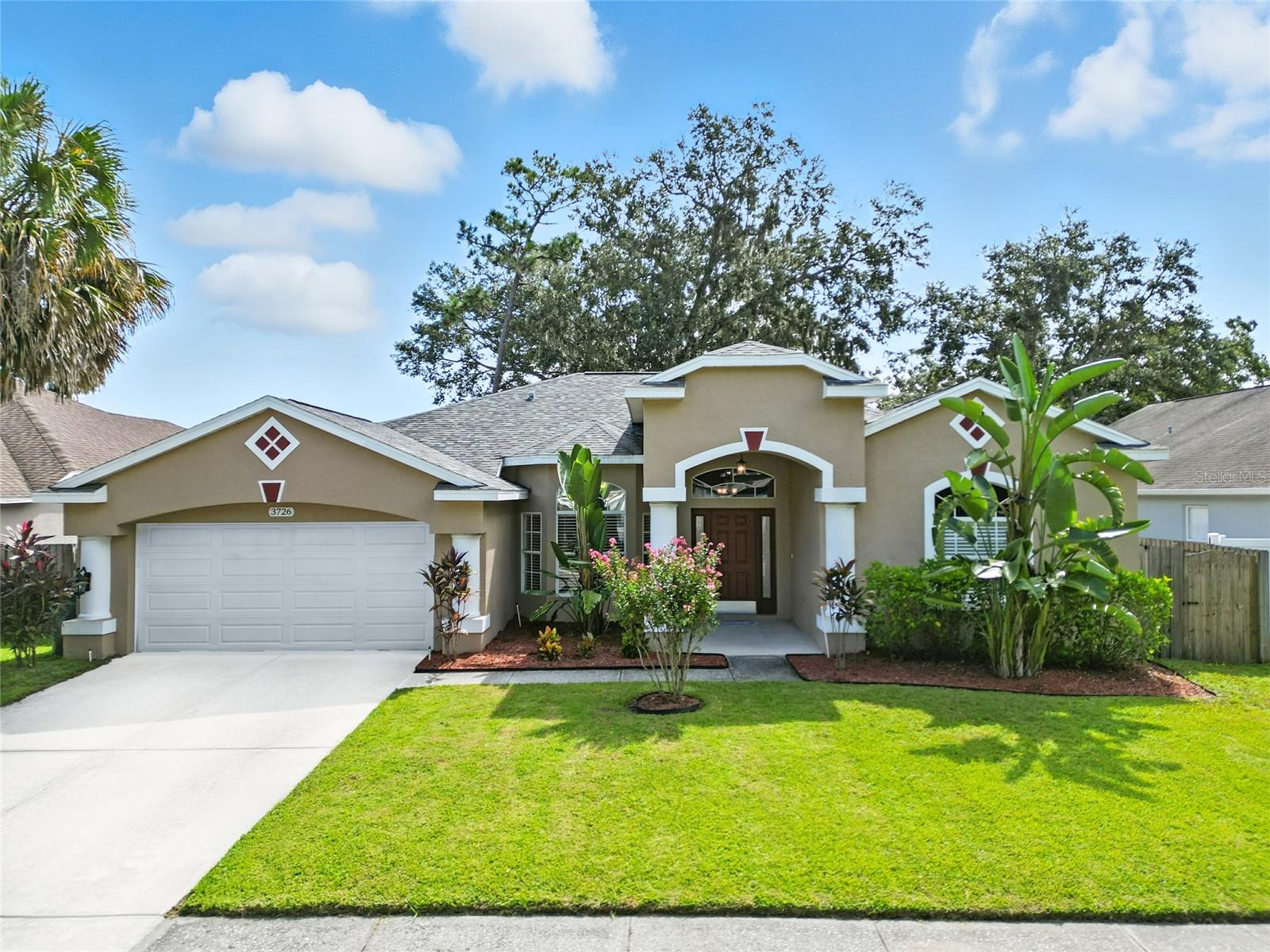 ACT NOW! Don’t miss this beautifully remodeled 4-bedroom, 3-bathroom pool home in the highly sought-after Bloomingdale neighborhood of Valrico with an available VA assumable loan at 2.875%. Perfectly situated on a quiet interior lot surrounded by mature trees and friendly neighbors who look out for one another, this home offers both comfort and convenience with quick access to HWY 640, the neighborhood YMCA, top-rated schools, shopping, dining, and scenic walking and biking paths.
Inside, the open-concept floor plan is designed for family living and entertaining. The spacious kitchen is a true centerpiece with custom cabinetry, granite countertops, ample counter space, generous storage, and a sunny breakfast nook with pool views. The kitchen flows seamlessly into the oversized family room, where large windows and sliding glass doors bring in abundant natural light and frame views of the pool and backyard.
The split-bedroom layout ensures privacy, with an expansive primary suite featuring a cozy sitting area, sliding doors that open directly to the covered patio and pool, his-and-hers walk-in closets, and a spa-inspired ensuite bath. Three additional bedrooms and two full baths offer flexibility for family, guests, or a home office. Fresh neutral paint and luxury vinyl plank flooring throughout the entire home—no carpet!—provide a modern, low-maintenance lifestyle.
Step outside to your private outdoor retreat—an expansive screened-in patio with sparkling pool and a fully fenced backyard, perfect for pets, play, and year-round Florida living.
This home combines thoughtful design, a prime location, and a welcoming community—ready for its new owners to enjoy!