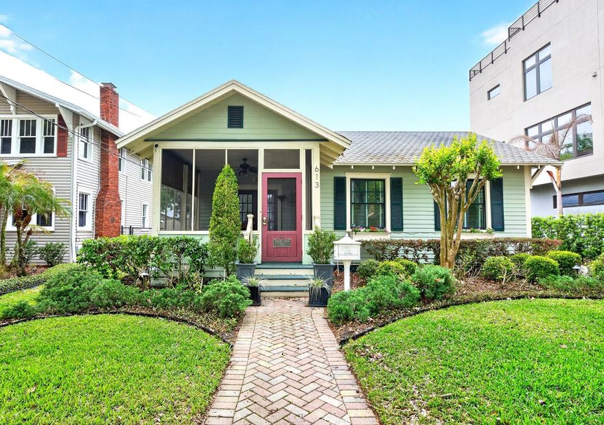 One or more photo(s) has been virtually staged. Seller may consider buyer concessions if made in an offer ~ As they say - LOCATION, LOCATION, LOCATION + a NEW A/C (2025)! This absolutely charming and thoughtfully UPDATED 3-bedroom, 2-bath historic 1924 home places you just blocks from the heart of Downtown Orlando and just steps away from Thornton Park and Lake Eola. Blending timeless character with modern updates, this home delivers the best of both worlds in one of Orlando’s most sought-after, lifestyle-rich locations. From the moment you arrive, the CURB APPEAL stands out with a brick paver driveway and walkway, mature trees, and an adorable SCREENED FRONT PORCH that sets the tone for what’s inside. Step through the front door and you will immediately notice the refinished ORIGINAL WOOD FLOORS, historic trim work, PLANTATION SHUTTERS and a light, inviting flow between the dedicated living and dining spaces. French doors in the dining area create a charming connection to the front entry, adding to the home’s unique character. The UPDATED KITCHEN is both functional and stylish, offering rich wood cabinetry, ample storage, an upgraded refrigerator with coordinating appliances, complementary backsplash, and a window over the sink. It flows naturally into the main living areas, making everyday living and entertaining feel easy and connected. The true PRIMARY SUITE is a standout feature – spacious and private with a WALK-IN CLOSET complete with custom built-ins, a well-appointed en-suite bath with a soaking tub and separate shower, and French doors that open directly to the back deck. Step outside to your own private sanctuary featuring a large deck, paver patio, mature landscaping, and a propane fire pit (2020), creating the perfect setting for relaxing evenings or entertaining guests. Additional highlights include TILE & WOOD FLOORING throughout, a spacious laundry room with storage, UPDATED BATHROOMS, and a detached 2-CAR GARAGE offering flexibility and functionality. Beyond the home itself, the location is hard to beat – walkable to Lake Eola Park, Thornton Park, restaurants, nightlife, and year-round events, with easy access to SR 408 and I-4, downtown venues like the Dr. Phillips Center, hospitals, and so much more! ZONED R-3B/T, this property also offers exceptional future potential – ideal for a duplex conversion, adding an ADU, or converting the detached garage for additional income opportunities in a high-demand area. This is a rare opportunity to own a home that’s rich in charm, thoughtfully updated for modern living, and positioned in one of Downtown Orlando’s most vibrant neighborhoods. Schedule your private showing today and experience all of the possibilities on East Pine Street!