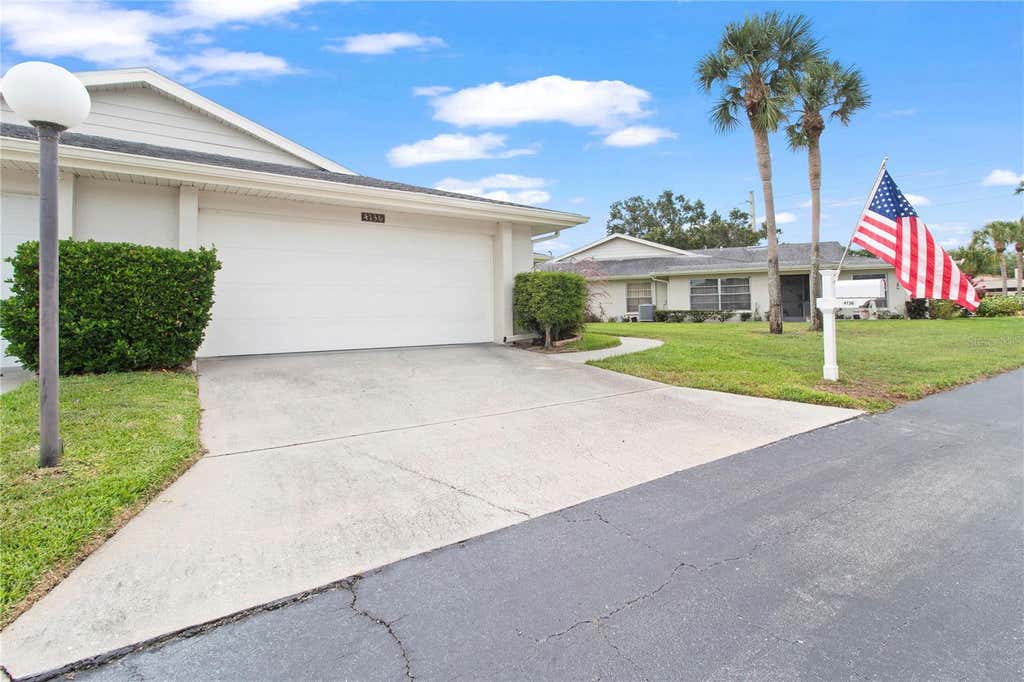 Photo of 4136 Bowling Green Circle #23, Sarasota, FL 34233 (MLS # A4696926)