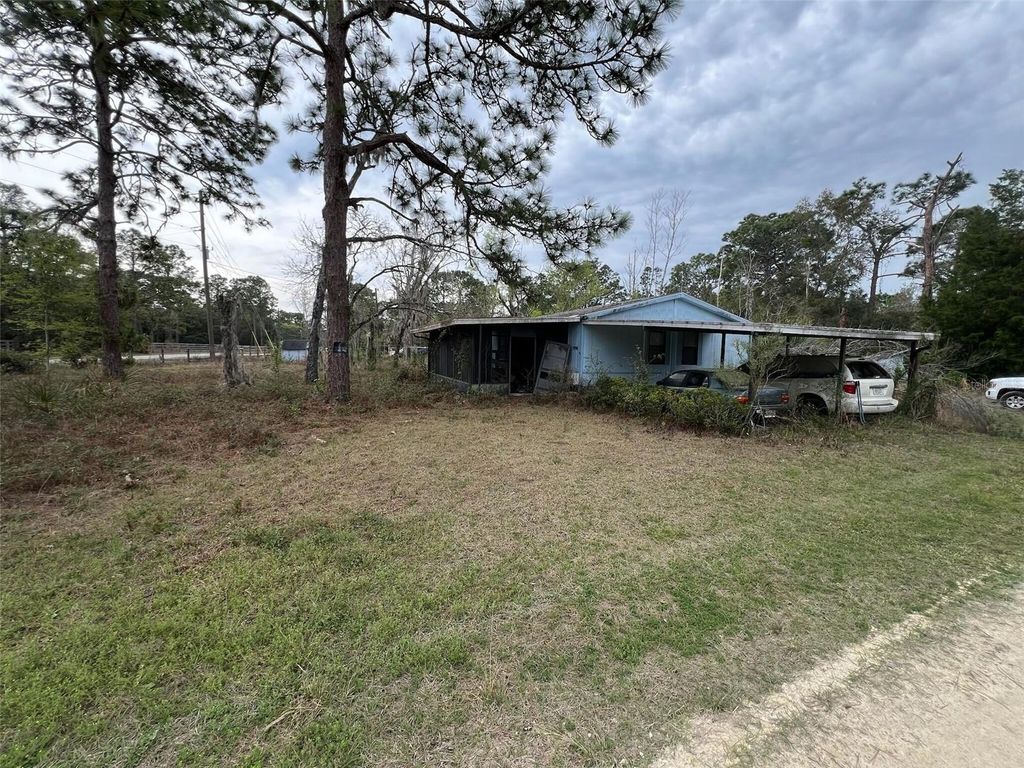 Photo of 7890 W Lefty Court, Crystal River, FL 34428 (MLS # O6285134)