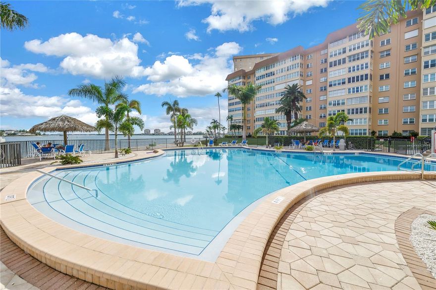 THIS IS TRULY FLORIDA LIVING AT ITS BEST!! Welcome to Point Brittany, a beautifully maintained waterfront 55+ community located in gorgeous St Petersburg, Florida. This spacious, RENOVATED 2 bedroom, 2 bathroom WITH LARGE BONUS ROOM condo overlooks the Boca Ciega Bay with spectacular views of the iconic Sunshine Skyway bridge. Located on the 5th floor, this property has it all – an updated kitchen with stainless steel appliances, designer marble countertops & backsplash, updated bathrooms, newer AC (2022), double pane impact glass windows, electric hurricane shutters, inside unit washer & dryer, walk-in closets and one (1) conveniently located covered parking space (parking space #2). This unit comes full furnished with two (2) king size beds in each bedroom. The bonus/office has a beautiful water view perfect for an office or study. Whether you’re in the kitchen or lounging on the sofa, you’ll love glancing over and seeing the Skyway bridge, especially in the evening when it’s all lit up. The 55+ Point Brittany community has so to offer you’ll feel like you’re living at a resort. There is over 2,000 feet of seawall, four heated pools, fitness center, tennis & pickleball courts, a clubhouse, ballroom, craft room, billiards, ping-pong table, card room, library, meeting rooms, fishing pier, barbecue area, a fire pit, a waterfront pavilion and gazebo, an on-site medical office, hair salon and the convenient Bayway Country Store. The community is gated with 24-hour security. Water, sewer, trash, cable & internet included. There is a stackable washer & dryer in the unit plus a full-size washer & dryer on each floor. NO PETS PLEASE. MINIMUM 6 MONTH LEASE. MAKE AN APPOINTMENT TODAY TO SEE THIS AMAZING PROPERTY!