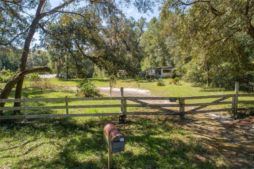 Discover a unique opportunity with this expansive 37-acre property, perfectly zoned for agricultural use. The boundary of the property is fully fenced, ensuring privacy and security. Nestled within this land, you'll find a lush forest of harvestable cypress trees, offering potential for both personal use or income production. Additionally, this property could be the ideal location for your future home, combining tranquility with the potential for development. For outdoor enthusiasts, the land is a haven for wildlife, making it a great property for hunting. An older mobile home situated on the property could serve as a hunting cabin, providing a shelter and base for your outdoor adventures. Additionally, a new well pump has been installed, ensuring a reliable water source for years to come. This property is located just a few minutes' drive from the scenic Suwanee River, with a local boat ramp about a 10-minute drive away, providing easy access for fishing and boating. Located in beautiful Dixie County, Florida, this area is known for its welcoming community, stunning natural landscapes, and abundant outdoor activities. Dixie County offers a peaceful, rural lifestyle while still providing essential amenities and services. Whether you're exploring the local springs, enjoying the Suwannee River, or participating in community events, you'll find that Dixie County is a wonderful place to call home. Whether you're looking to invest in agriculture, enjoy the serenity of nature, or indulge in hunting activities, this property offers endless possibilities.