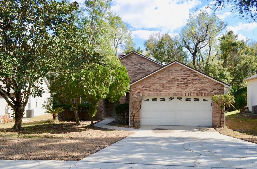 This charming 3 bedroom, 2 bath brick home is ready for it's new owner. With over 1,700 square feet of living space and full 2-car garage, this home makes the perfect investment property or homestead and build equity with every improvement you make along the way! Located on the outskirts of the greater Orlando yet tucked away in a small neighborhood, you will enjoy a lifestyle of both comfort and convenience. Opportunities are endless!