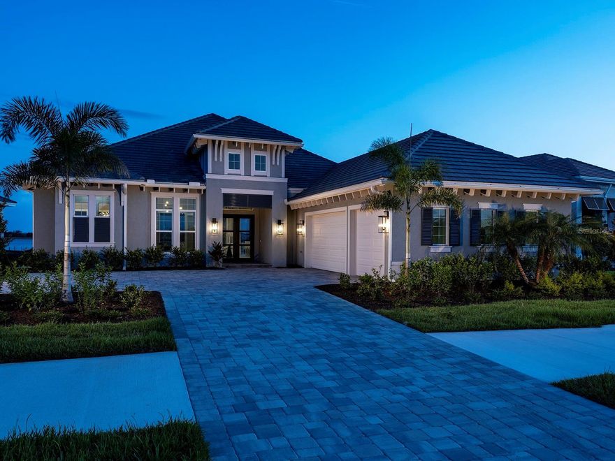 Welcome to Wild Blue at Waterside, where luxury coastal living meets natural beauty. Stock Luxury Homes presents an exquisite blend of timeless architecture, semi-custom details, and expansive open spaces. This stunning MODEL HOME features 3 bedrooms, 4.5 bathrooms, a spacious Great Room, elegant Dining Room, a dedicated Study, and 3 car garage.   Enjoy seamless indoor-outdoor living with a dynamic outdoor space complete with a pool, spa, outdoor kitchen and fireplace. This MODEL HOME is being sold with leaseback terms through February of next year. This Quick Close Sales Price includes the furniture and decor package!