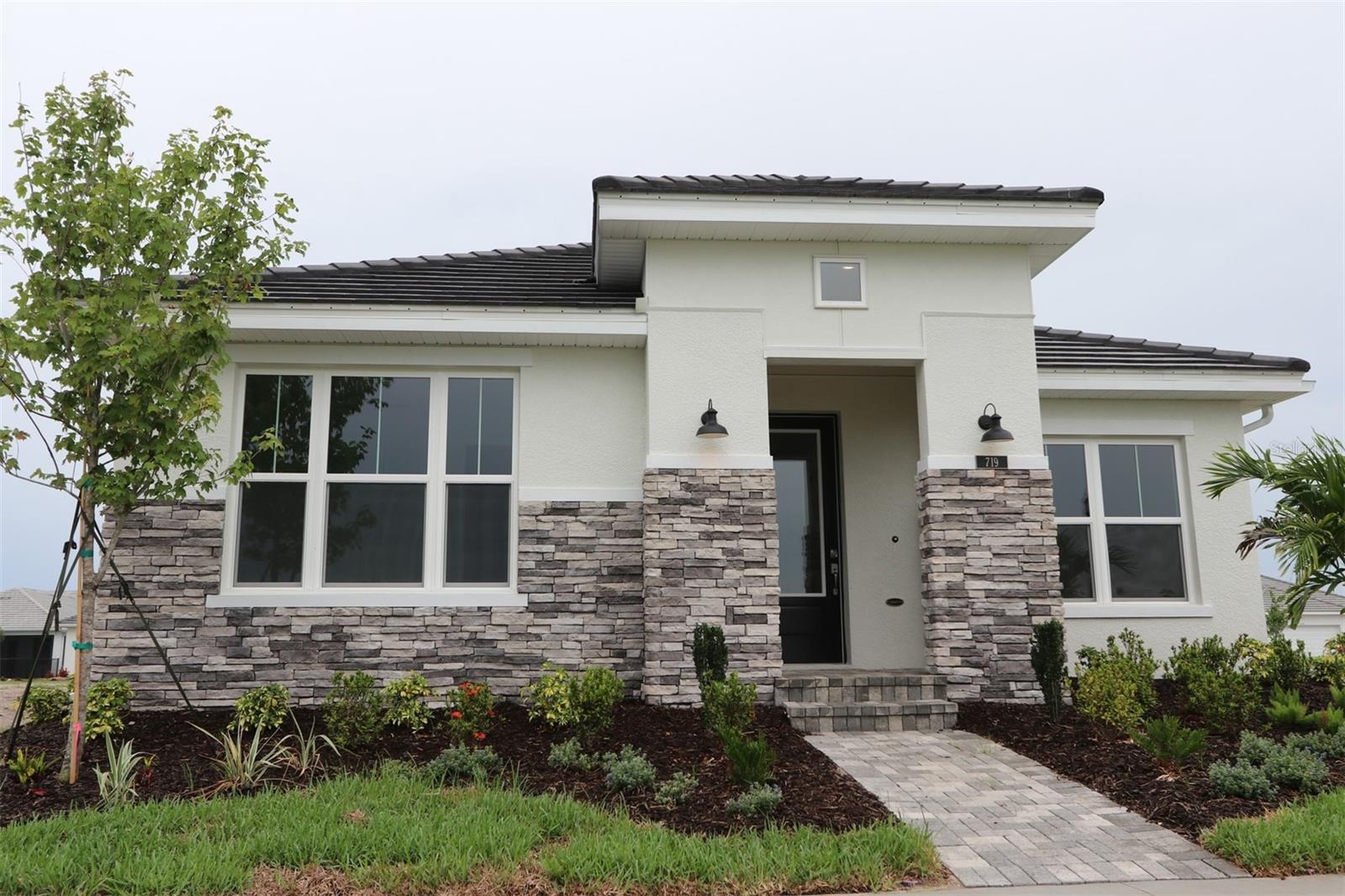 Step into comfort and style with this thoughtfully designed Mapleton floorplan by David Weekley Homes. Boasting 3 bedrooms, 2 bathrooms, and a versatile enclosed study, this home offers a unique layout that lives much larger than its square footage suggests.
Enjoy peace of mind with impact-resistant windows and delight in the natural light that pours through extra-large windows throughout the home. The private owner’s retreat, tucked away at the rear of the home, provides a serene escape from the hustle and bustle.
At the heart of the home, the expansive kitchen is a chef’s dream—featuring an abundance of cabinetry, generous prepping areas, and wide countertops perfect for cooking, entertaining, or casual dining.
Located in a vibrant community, you'll have access to resort-style amenities including a sparkling pool, fitness center, game room, and an on-site activities director who curates events for all ages. Plus, lawn maintenance is included, giving you more time to enjoy everything this lifestyle-focused neighborhood has to offer.
Discover a home that combines smart design with exceptional value—welcome to your new Mapleton.