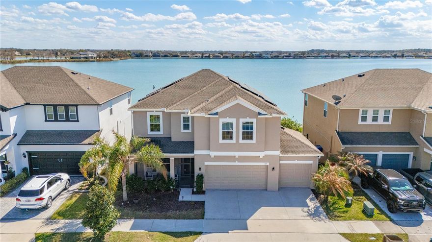 TRUE LAKEFRONT LIVING PRICED $50,000 UNDER MOST RECENT APPRAISAL!!  

Welcome to lakefront living at its finest in the gated community of Waterside Pointe, located on the highly desirable Clermont Chain of Lakes. This beautifully maintained five-bedroom, three-bathroom home offers space, lifestyle, and rare boating access to 11 interconnected lakes right from your backyard.

From the moment you arrive, this property is a standout. The home sits on a waterfront lot with peaceful views and direct canal access leading to the entire Clermont Chain of Lakes. Just steps from your front door are your private dock and boat lift, making it easy to spend the day boating, visiting lakefront restaurants, or enjoying the sunset across one of Central Florida’s most sought-after lake systems.

Inside, the layout is ideal for both everyday living and entertaining. In addition to the oversized five bedrooms and three full bathrooms, there is a dedicated office on the first floor, and a large upstairs loft that works perfectly as a media room, second living area, or play space. The open feel and natural light throughout the home create a comfortable and inviting environment.

The kitchen is especially appealing for anyone who loves to cook, featuring a GAS STOVE powered by a private propane tank. Gas cooking is extremely rare in this neighborhood, making this home stand out from the rest.

One of the highlights of the property is the oversized screened-in lanai designed for true Florida living. This upgraded outdoor space includes built-in lighting, ceiling fans, and plenty of room to relax while enjoying tranquil lake views and breezes off the water.

The garage also includes a built-in workshop, perfect for hobbies, storage, or projects. In addition, the home will come equipped with FULLY PAID OFF SOLAR PANELS to reduce the burden of electric bills.

Beyond the home itself, residents of Waterside Pointe enjoy a lifestyle that feels like a private resort. The community features a resort-style pool with a waterslide, tennis courts, a full-size basketball court, a fitness center, and a playground. Golf carts are also allowed throughout the neighborhood, adding to the relaxed waterfront atmosphere.

Schedule your private showing today and experience the lifestyle you’ve been dreaming of at WaterSide Point!