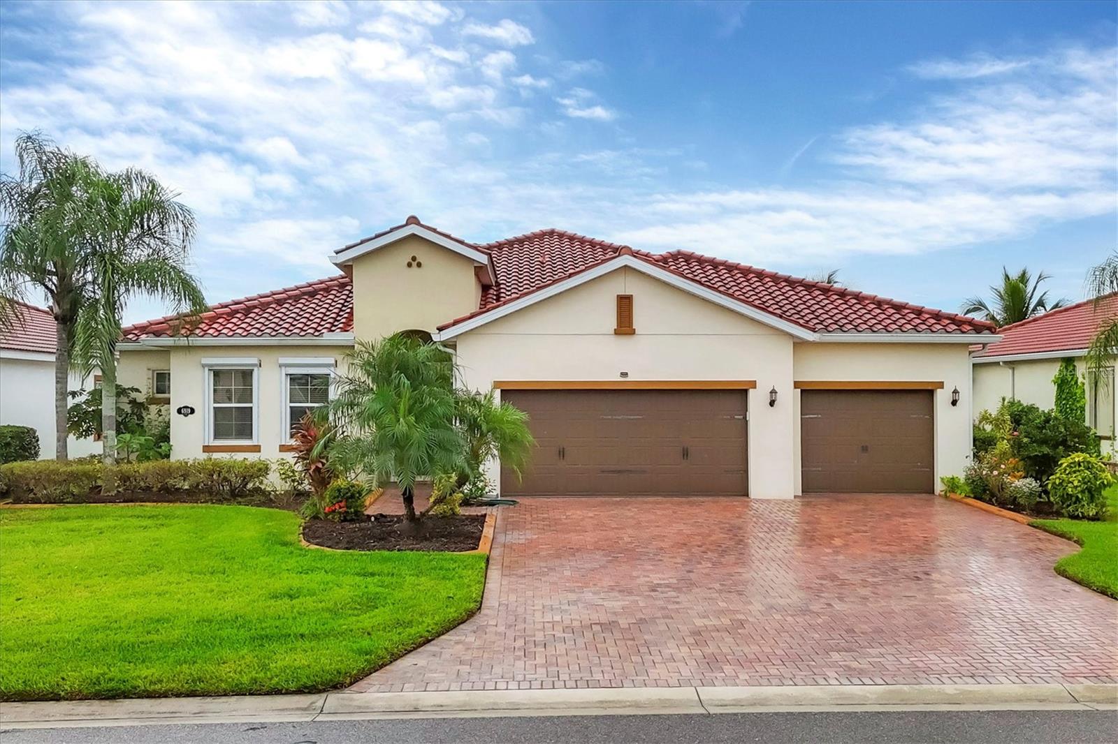 Rare Opportunity in Nalanda Estates – Dream Retirement Haven!
Step into a lifestyle filled with comfort, culture, and community with this immaculately maintained 3 bedroom, 3 bathroom plus office home, showcasing the sought-after Darjeeling Floor Plan. Perfectly located in the highly desirable Nalanda Estates in Parrish, Florida, this home is not just a place to live—it’s the beginning of a vibrant new chapter.
From the moment you arrive, you’ll notice the thoughtful upgrades and pride of ownership that make this residence stand out. As you step inside, the spacious open layout welcomes you with upgraded tile flooring throughout the main living areas, elegant crown molding, and abundant natural light. The chef-inspired kitchen is a dream, featuring solid wood cabinets, stainless steel appliances, granite countertops, an upgraded backsplash, and a custom hood venting outside—perfect for creating meals while entertaining family and friends.
The extended lanai overlooking a peaceful lake view offers the perfect setting to enjoy your morning tea/coffee or evening coffee/tea, soak in the serenity, or host gatherings in the beautiful Florida weather.
This home was built with modern conveniences and energy efficiency in mind. It comes equipped with:
• 24 fully paid solar panels for incredible savings on electricity
• Hurricane accordion shutters for peace of mind
• Garage EV charging port for your electric vehicle
• Upgraded custom cabinetry and storage solutions throughout the home
• Gutters installed for added functionality
If gardening is your passion, you’ll love the opportunity to create your very own backyard retreat, whether that’s fresh vegetables, fruit trees, or a flourishing herb garden—already made simple by the home’s layout and yard space.
Beyond the home itself, Nalanda Estates offers a lifestyle like no other. This is not just a community—it’s a Dream Retirement Haven where neighbors become lifelong friends. Enjoy a huge ballroom for cultural celebrations and social events, a theater room showing Bollywood movies, a resort-style pool, pickleball courts, fitness center, and dedicated areas for cards, bingo, and group activities. With a full calendar of events and daily opportunities to connect, there is always something to do, something to celebrate, and someone to share it with.
This combination of a beautifully upgraded home, a serene lakefront setting, and a community designed around connection and culture is truly rare—and opportunities like this do not come often.
Whether you’re seeking a place to relax, engage, or thrive, this home offers it all. Don’t wait—schedule your private showing today and come see for yourself why this is more than just a house, it’s a lifestyle!