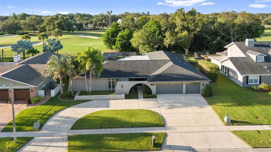ATTENTION!!!  Here it is!!  BIG LIST OF MAJOR CAPITAL IMPROVEMENTS!! NON-FLOOD, NON-EVACUATION, GOLF COURSE FRONTAGE, NEW ROOF SEPTEMBER 2025, UPDATED POOL PACKAGE 2024 (Pool Deck, Pool Surface, Screen enclosure and equipment), FRESH PAINT 2025, UPDATED FLOORING 2025, UPDATED ELECTRICAL 200 AMP PANELS, CAR CHARGING STATION, HOT WATER HEATER 2022, UPDATED HIGH-END APPLIANCES 2022, TRANE 2-STAGE 17 SEER A/C 2024....... Welcome Home to this amazing 5 BEDROOM, 3 BATHROOM, 3 CAR GARAGE, POOL HOME. Located in the HEART of COUNTRYSIDE with GORGEOUS GOLF COURSE VIEWS!!   This GORGEOUS HOME has all of the bells and whistles!  FEATURES and UPDATES include..... HIGH QUALITY Owens Corning ROOF installed SEPTEMBER 2025 with MANUFACTURERES TRANSFERRABLE WARRANTY, UPDATED "TOP-OF-THE-LINE" KITCHENAID APPLIANCE PACKAGE (2024), TRANE 5 TON 2-STAGE 17 SEER A/C (2024), HOT WATER HEATER (2022), INTERIOR PAINT (2022), SMART IRRIGATION CONTROL (2025) with IRRIGATION on a WELL, TWO (2) UPDATED 200 AMP ELECTRICAL PANELS, 50AMP ELECTRIC CAR CHARGING STATION, HUGE CIRCULAR DRIVEWAY, HIGH END GE FRONT LOAD WASHER and DRYER on PEDESTALS (2022), TOTALLY UPDATED POOL PACKAGE in 2024 including NEW SCREEN ENCLOSURE, TRAVERTINE POOL DECK, POOL LIGHT, PEBBLETEC STYLE POOL SURFACE, POOL PUMP, and POOL CLEANER ROBOT.  Additional recent upgrades include.... EXTERIOR PAINT, INTERIOR PAINT, WIRELESS GARAGE CONTROLLERS AND OPENERS, EXTERIOR LIGHT FIXTURES, NEW KARASTAN CARPETING, UPGRADED FLOOR MOLDING.  Only a SHORT GOLF CART RIDE to COUNTRYSIDE COUNTRY CLUB which features 27 HOLES OF GARY PLAYER DESIGNED GOLF with PRACTICE FACILITIES, 14 LIGHTED TENNIS COURTS, STATE-OF-THE-ART FITNESS FACILITIES with OUTDOOR POOLS, and BEAUTIFUL DINING and BANQUET FACILITIES! CLOSE TO RESTAURANTS, SHOPS, HOSPITALS AND COMMUNITY CENTERS. A SHORT COMMUTE TO TAMPA INTERNATIONAL AIRPORT, DUNEDIN CAUSEWAY and HONEYMOON ISLAND, ST.PETE/CLEARWATER INTERNATIONAL AIRPORT and less than 30 minutes to the FAMOUS PINELLAS COUNTY BEACHES! CALL TODAY!!! THE COUNTRYSIDE AREA is SELLING FAST! IT'S the HIGHEST AREA / ELEVATION IN PINELLAS COUNTY. DO NOT MISS THIS OPPORTUNITY!!