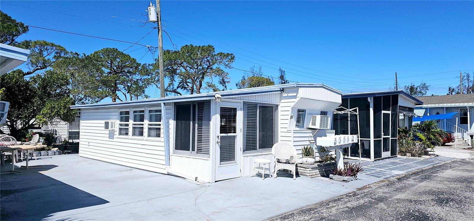 Charming & Refurbished 1BR/1BA in Paradise Bay – Active 55+ Community! Step into your beautifully refurbished and TURNKEY FURNISHED 1BR/1BA mobile home in the sought-after Paradise Bay community! Recently updated following the Helene/Milton hurricanes of 2024, this cozy retreat features refreshed lower kitchen cabinets and a full-sized washer/dryer conveniently located in the shed. Enjoy an active lifestyle in this vibrant 55+ community, offering a heated pool and hot tub, shuffleboard and pickleball courts, and an engaging clubhouse that hosts shows, potlucks, bingo nights, and more! Nestled along the breathtaking Sarasota Bay, Paradise Bay boasts a community boat ramp and charming waterfront gazebos—perfect for soaking in stunning sunsets. Plus, you're less than 2 miles from the white sandy beaches of Anna Maria Island—easily accessible by boat, car, bike, or even a scenic walk!
Don't miss this opportunity to own your piece of Florida paradise. Schedule a showing today!