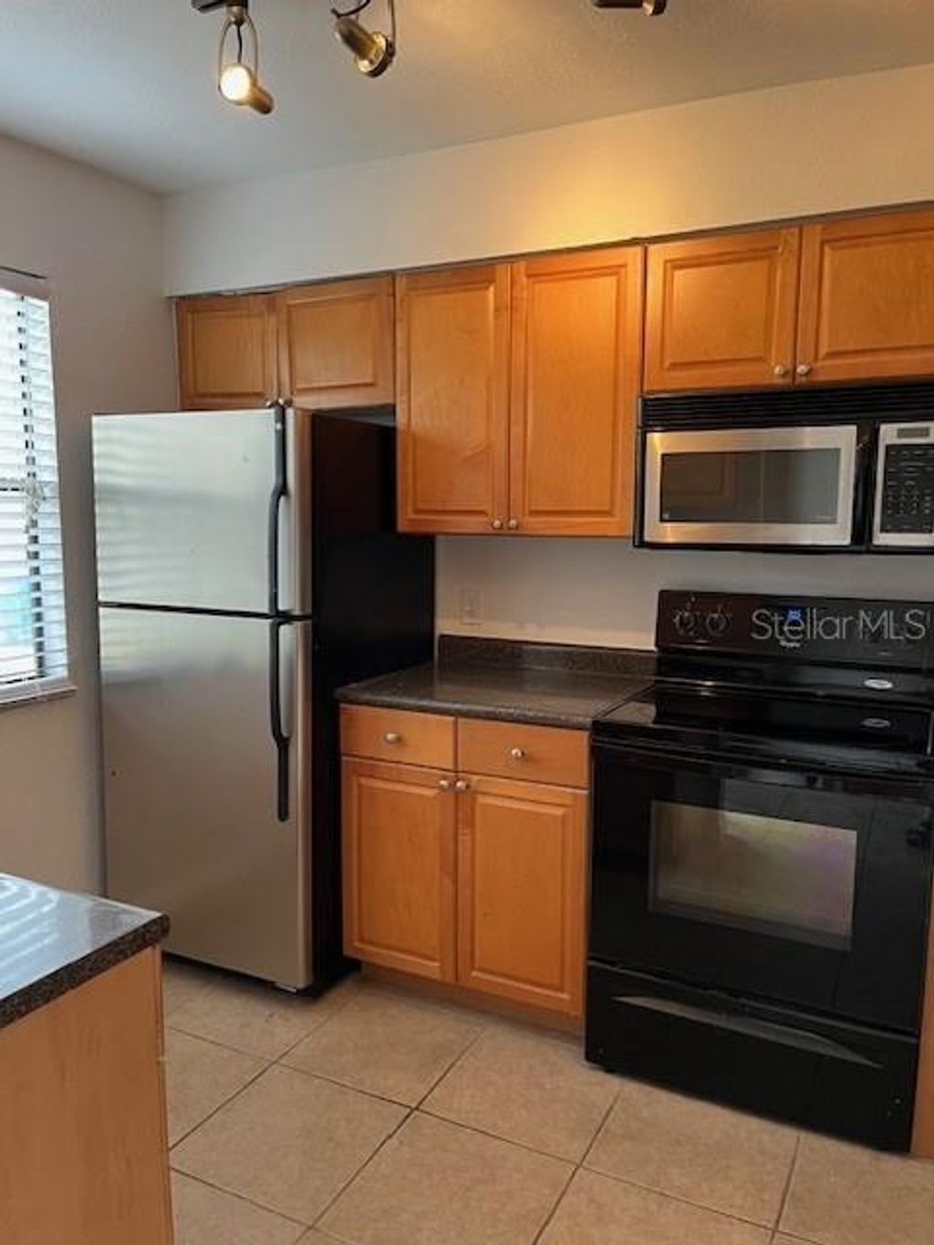 Photo of 10196 Sailwinds Boulevard S #103, Largo, FL 33773 (MLS # TB8442100)