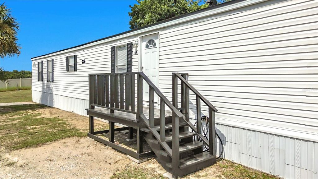 Photo of 1406 Finney Road, Davenport, FL 33837 (MLS # O6428288)
