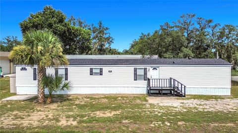 Photo of 1406 Finney Road, Davenport, FL 33837 (MLS # O6428288)