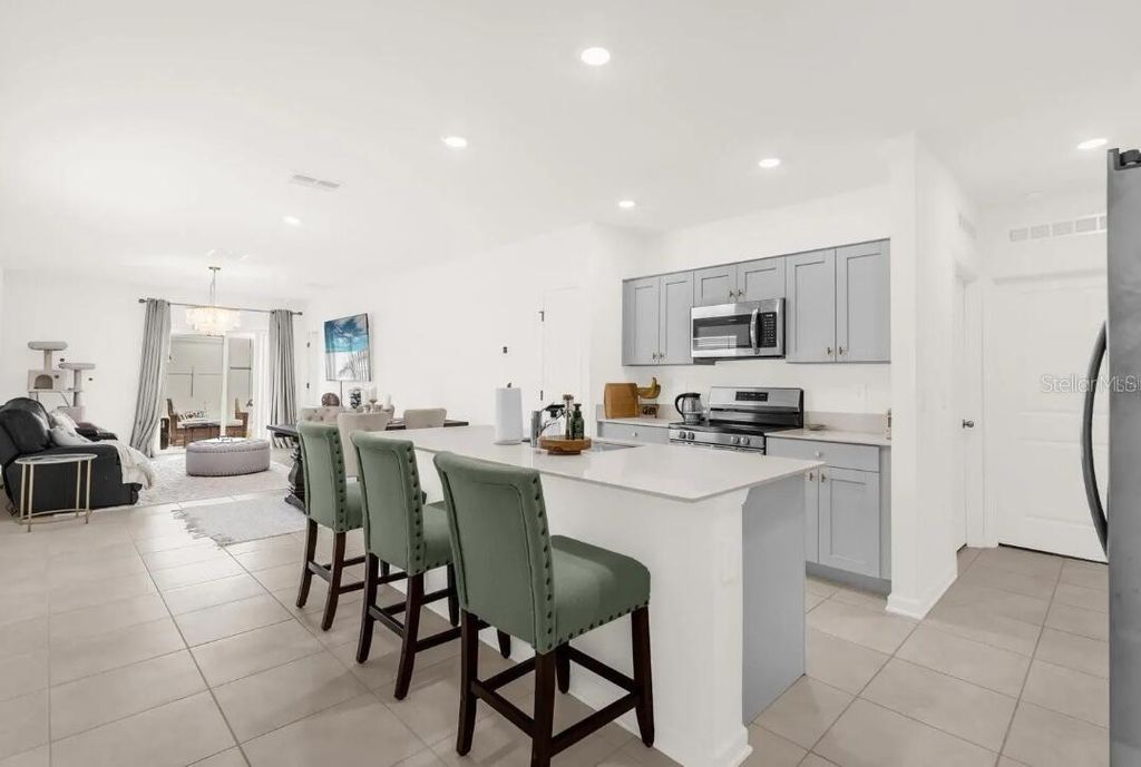 Photo of 509 Sea Turtle Lane, Haines City, FL 33844 (MLS # O6391795)