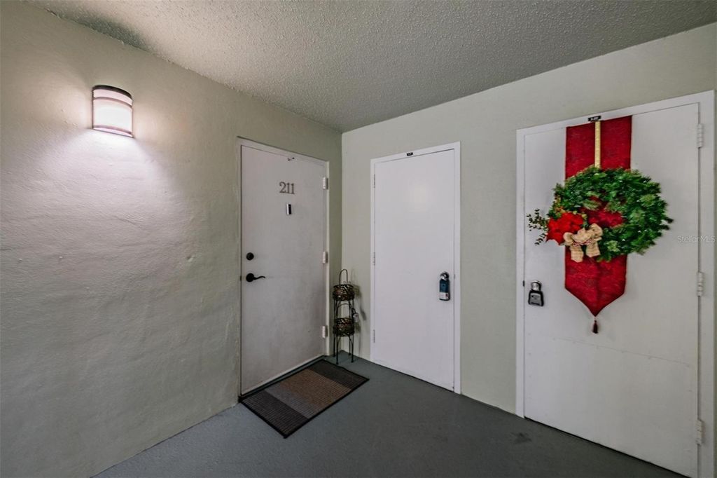 Photo of 9 Forbes Place #211, Dunedin, FL 34698 (MLS # TB8463557)