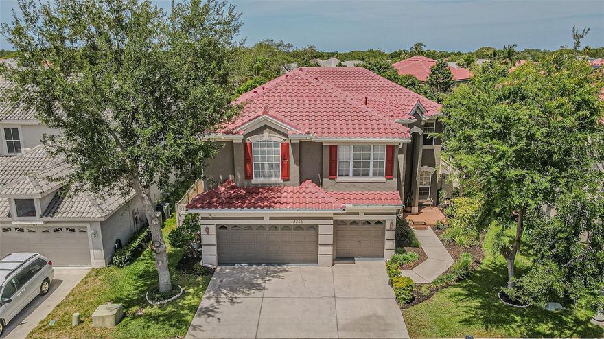 Nestled in the highly sought-after Highland Woods community, this beautifully maintained 5-bedroom, 3-bathroom home offers the perfect blend of luxury, comfort, and Florida living just minutes from Honeymoon Island State Park, shopping, dining, and entertainment. Designed for both relaxing and entertaining, the home features spacious living areas filled with natural light, a bonus living room upstairs, and a built-in speaker system throughout multiple rooms. The open layout flows seamlessly to the private outdoor lanai with a fully equipped outdoor kitchen and grill overlooking a stunning screened-in tropical-style pool, complete with a jacuzzi, mini waterfall, and a brand-new pool heater and pool robot vacuum cleaner to be replaced before closing. The fully fenced backyard provides plenty of room for family and pets, while additional upgrades include a spacious 3-car garage, hurricane film installed on all windows, and a brand-new roof and gutters installed in January 2026. Located in a gated community with low HOA fees, this exceptional home is move-in ready and waiting for its next owner!