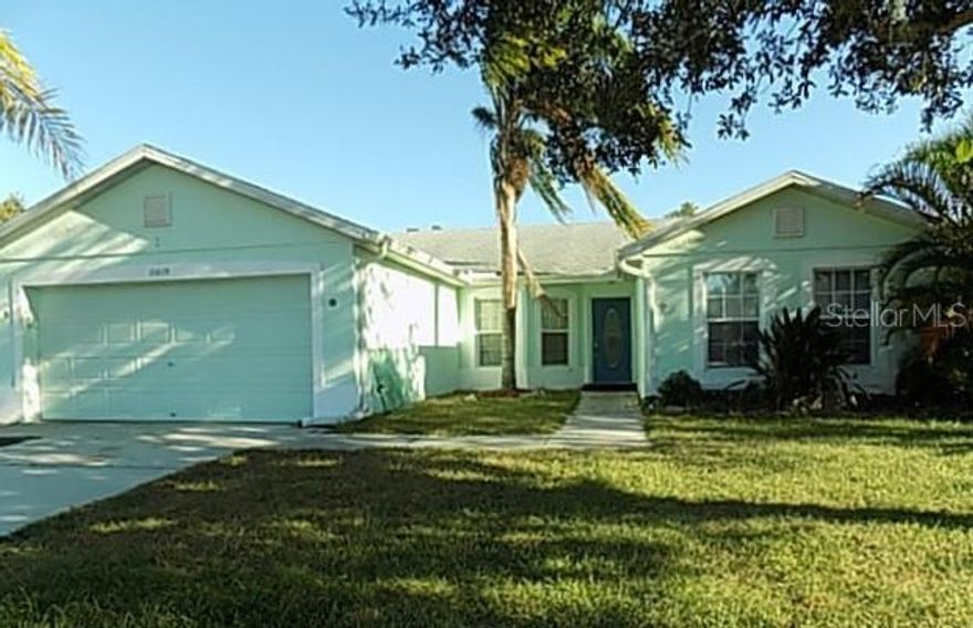 This 4-bedroom, 2-bath block home offers a solid foundation and endless potential. Enjoy a screened-in pool and lanai overlooking peaceful private preserve views, creating a tranquil fenced outdoor retreat. Inside, vaulted ceilings enhance the sense of space, while the formal dining area and split floor plan provide both functionality and privacy. A dedicated laundry room adds convenience. Nestled on a quiet cul-de-sac, the property offers a desirable location close to shopping, schools, restaurants, and easy access to I-75. With vision and updates, this home is a fantastic opportunity to restore and personalize a space with great bones in a prime location.