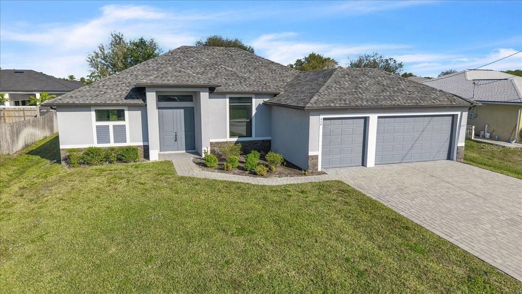 Photo of 459 NE 2nd Place, Cape Coral, FL 33909 (MLS # C7519469)