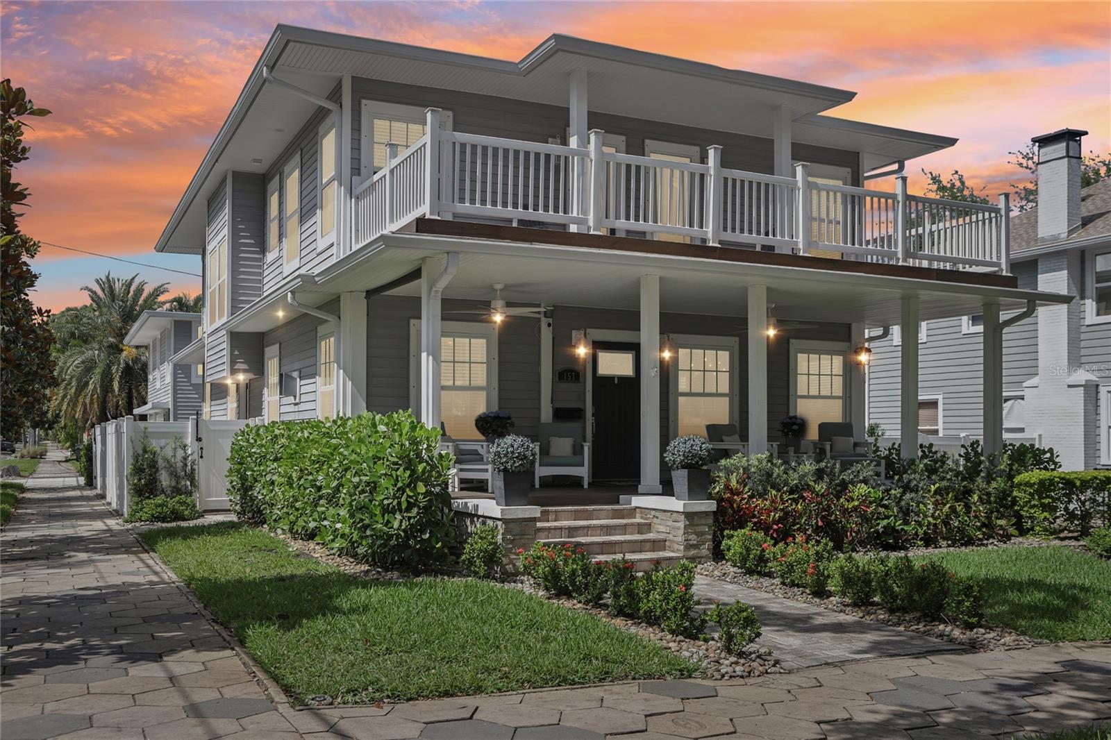 Live the Old Northeast lifestyle in this charming and thoughtfully updated pool home, just blocks from downtown St. Pete and its beautiful waterfront parks. Situated on a tree-lined corner lot, this home offers the perfect blend of character, comfort, and convenience in one of the city's most desirable historic neighborhoods.
The main house features 5 bedrooms and 5.5 bathrooms, along with a welcoming front porch where you can relax and enjoy the neighborhood vibe. Inside, the layout offers an easy flow between the living, dining, and kitchen areas, creating cozy and functional spaces designed for everyday living. The kitchen features Jenn-Air professional-grade appliances, gas cooktop, pot filler, farmhouse sink, and a touchscreen convection microwave.
The main-floor primary suite includes a gas fireplace, custom closet, and a beautifully finished bathroom with teak floor accents, a freestanding tub with a towel warmer, and a walk-in shower with rain head and body jets. Upstairs, each of the four bedrooms has its own en-suite bathroom and private balcony access, perfect for guests, family, or a home office setup.
Major updates have been completed throughout, including new plumbing, electrical, HVAC, insulation, and a 2022 roof. You'll also appreciate upgraded lighting, cove accents, a whole-home Sonos system, two tankless water heaters, water softener, and upstairs laundry for added convenience.
Out back, the fully fenced yard is designed for low-maintenance enjoyment with a saltwater gas-heated pool, outdoor pool bath, built-in Blaze grill, and flagstone patio. The separate 1 bed and 1 bath guest house with its own entrance, kitchenette, washer and dryer, and separate meter offers excellent flexibility for rental income or extended stays.
A two-car garage with driveway and a large carport provide plenty of off-street parking and storage.
This home offers quick access to all the downtown amenities St. Pete is known for. Walk, bike, or take a golf cart to Beach Drive, the Dali Museum, restaurants, shopping, and more. No flood zone, no evacuation zone, and a rare opportunity to own a move-in-ready home in Old Northeast. Come see it today!