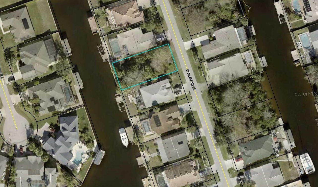 Beautiful 60 x 125 lot in Sailboat Country on a Saltwater Canal. Only minutes to the Intracoastal waterway. Property already has a Sea Wall in place and some mature palms. No fixed bridges to the Intracoastal Waterway. Drive by and discover the possibilities for your new home. Plans available to fit this lot with SeaGate Homes.